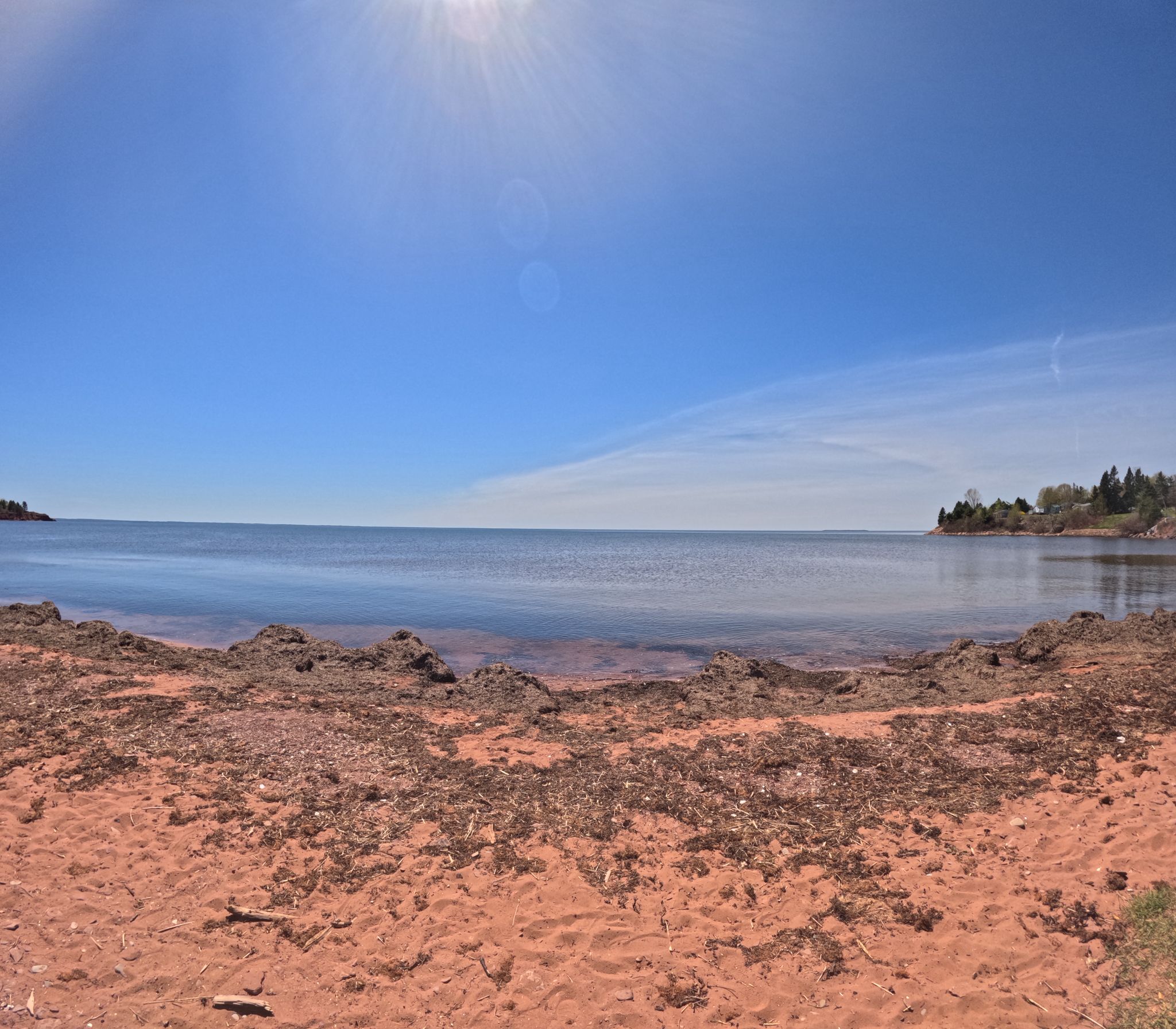 Kinlock Beach, Stratford PEI — calm red-sand shoreline on the Hillsborough River